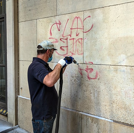 Graffiti on wall before blasting